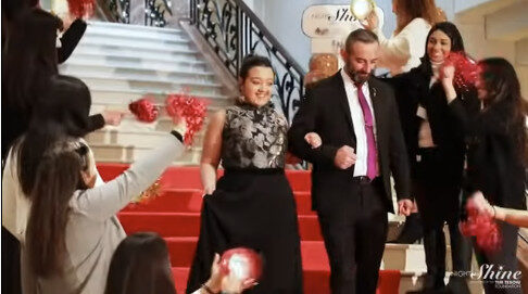 Night to Shine attendee walking down stairs