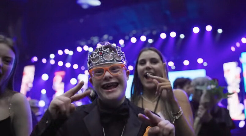 Night to Shine attendee with crown on